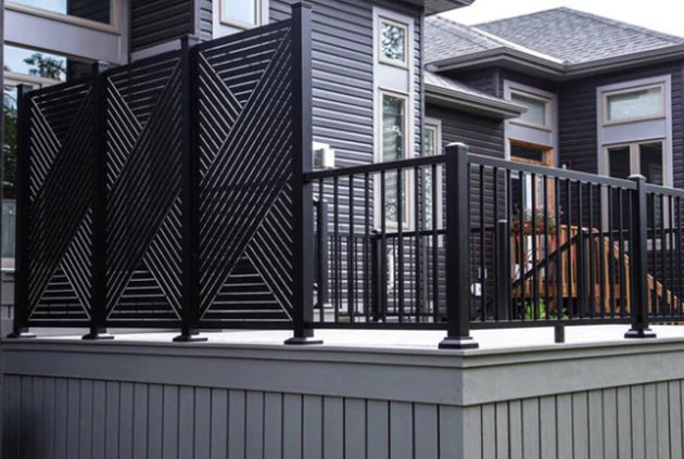 Composite deck with black privacy fencing
